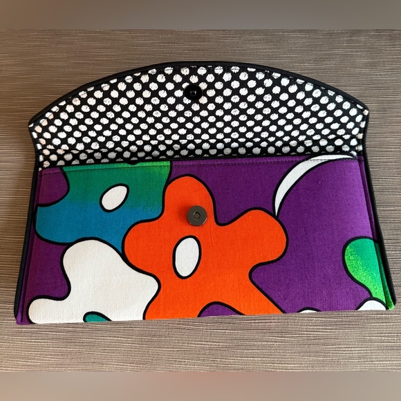 Carrying this clutch, handmade by Kent Stetson, will spark a fun conversation. - Picture 3 of 6